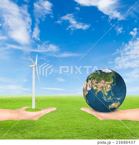 hand holding wind turbine and earth hand holding wind turbine and earth 23686437
