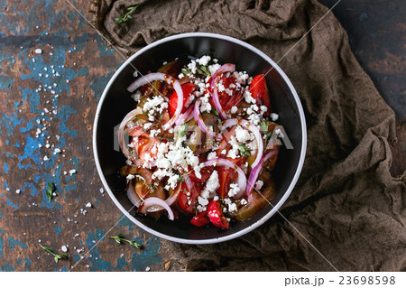 Tomatoes and onion salad 23698598