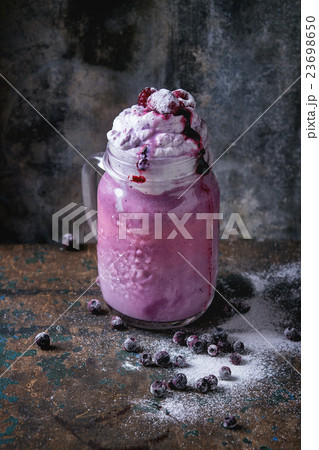 Blueberry smoothie cocktail 23698650