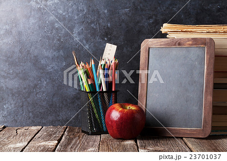 Books, supplies and chalk board for your text 23701037