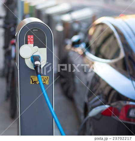 Electric Car in Charging Station. Electric Car in Charging Station. 23702217