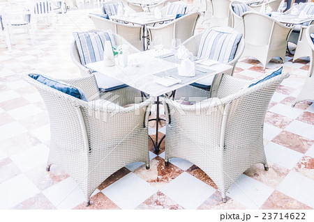 Empty table and chair Empty table and chair 23714622