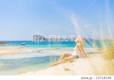 Relaxed Happy Woman Enjoying Sun on Vacations. 23718199