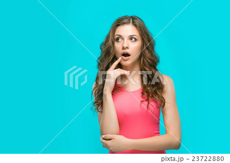 The young woman's portrait with thoughtful The young woman's portrait with thoughtful 23722880