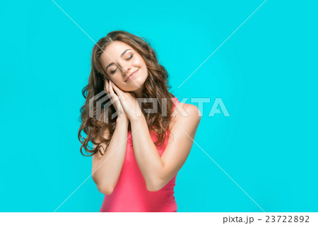 The young woman's portrait with thoughtful The young woman's portrait with thoughtful 23722892