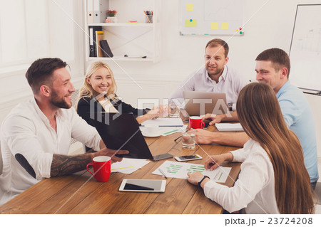 Business meeting. Young hipsters businessmen and Business meeting. Young hipsters businessmen and 23724208