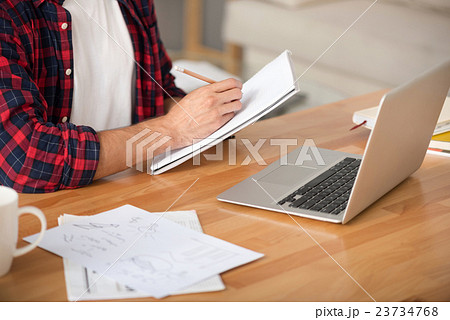 Pleasant man making notes 23734768