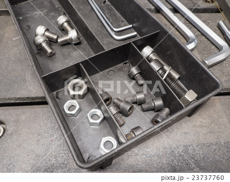 Nut and screw in the black box. 23737760