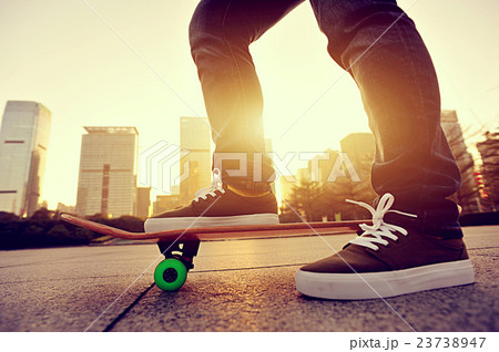 skateboarder legs skateboarding at sunrise city skateboarder legs skateboarding at sunrise city 23738947