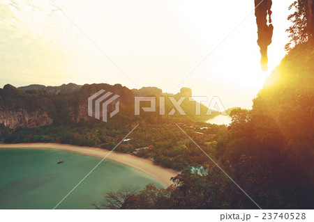 landscape with sunrise through the cliff   23740528