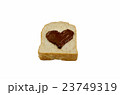 slice bread with heart shape of chocolate spread. 23749319