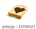 slice bread with heart shape of hazelnut spread. 23749321