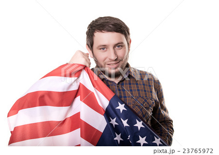 Fan celebrating and holding the flag of USA 23765972