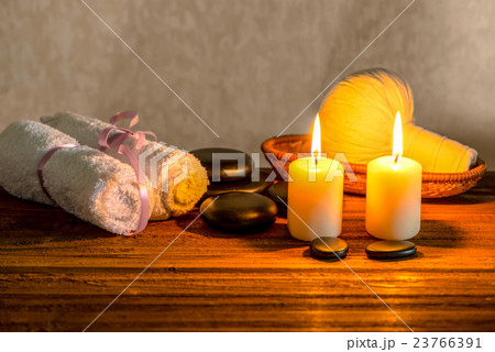 spa still life of towels, candles, thai herbal  23766391