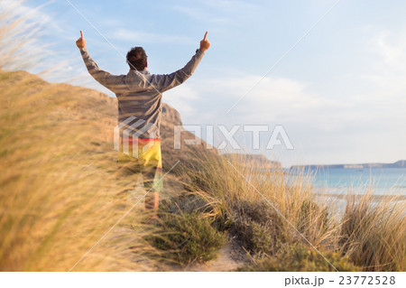 Free active man enjoying beauty of nature. Free active man enjoying beauty of nature. 23772528