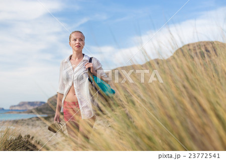 Free Happy Woman Enjoying Sun on Vacations. 23772541