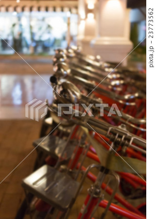 red retro bicycle on street, abstract blur image 23773562