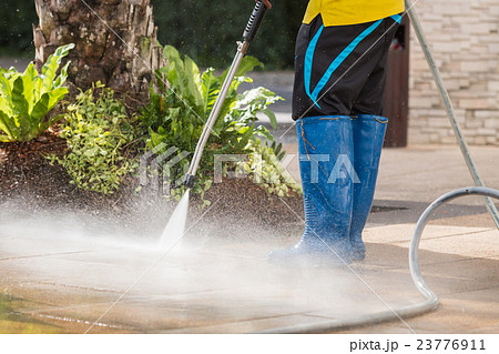 Close up Outdoor floor cleaning with high pressure water jet 23776911