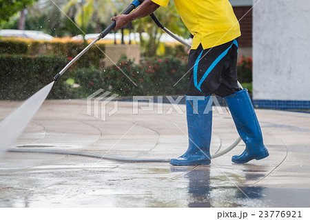 Close up Outdoor floor cleaning with high pressure water jet Close up Outdoor floor cleaning with high pressure water jet 23776921