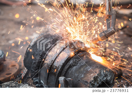 Worker cutting steel using metal torch Worker cutting steel using metal torch 23776931