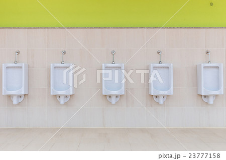 Row outdoor urinals Men public toilet Row outdoor urinals Men public toilet 23777158