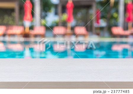 Empty top wooden table and abstract blurred and bokeh 23777485