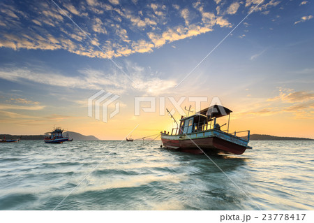 Fishing boat stand at sunrise beach in Phuket Fishing boat stand at sunrise beach in Phuket 23778417