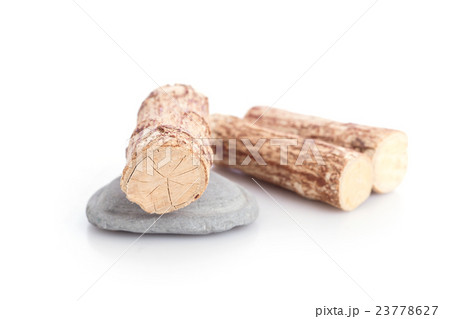 Thanaka wood and grey Kyauk Pyin stone slabs isolated on white Thanaka wood and grey Kyauk Pyin stone slabs isolated on white 23778627
