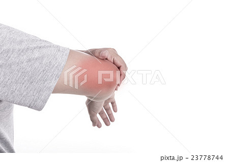Close up woman's hand holding her elbow isolated on white. Elbow pain concept. Close up woman's hand holding her elbow isolated on white. Elbow pain concept. 23778744
