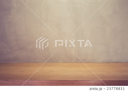 Grey wall and top wooden table or counter. For product display Grey wall and top wooden table or counter. For product display 23778831