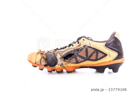 Old football shoes isolated on white 23779106