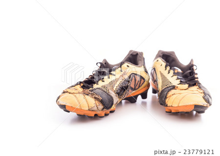 Old football shoes isolated on white 23779121
