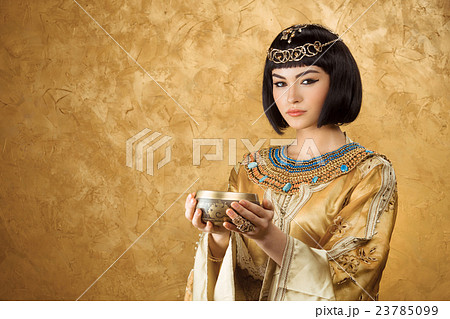 Beautiful woman like Egyptian Queen Cleopatra with 23785099