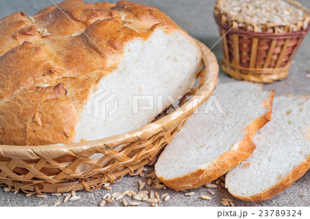 Sliced white bread and seeds 23789324