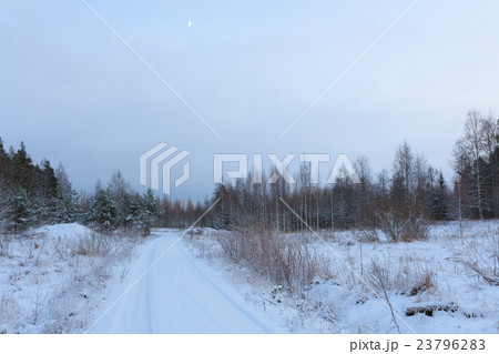 Snow dirt road at countryside 23796283