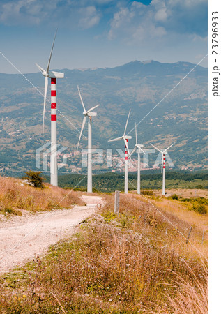 landscape with hills and wind turbines 23796933