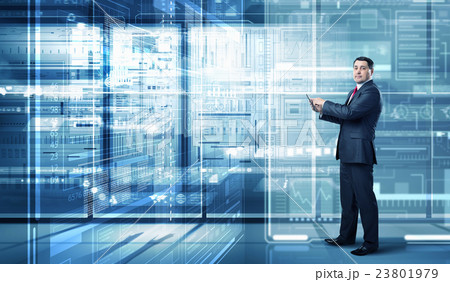 Businessman use tablet pc . Mixed media 23801979