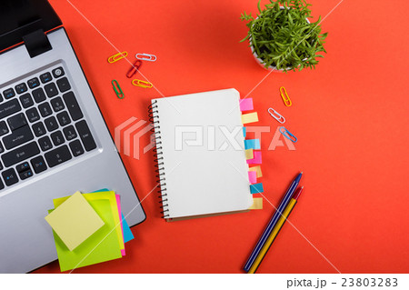 Office table desk with set of colorful supplies 23803283