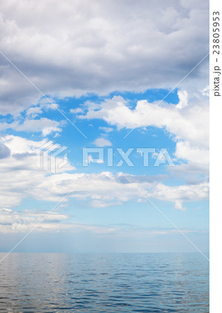 cumulus clouds over calm blue water Sea of Azov 23805953