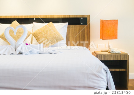 Pillow on bed 23813450