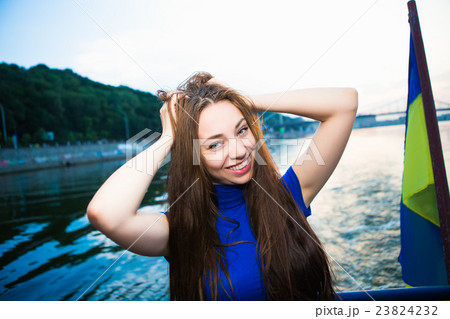 Portrait of beautiful cheerful woman Portrait of beautiful cheerful woman 23824232