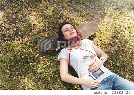 Woman Lying In The Park Relaxation Concept Woman Lying In The Park Relaxation Concept 23832426