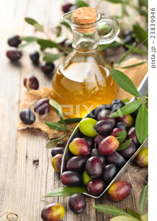 Fresh olives and olive oil. 23839946