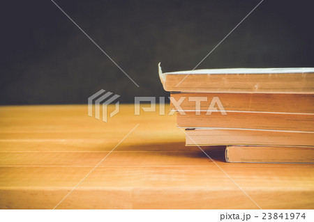 Parts of book on wooden table retro tone Parts of book on wooden table retro tone 23841974