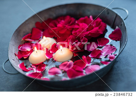 red roses and candles 23846732