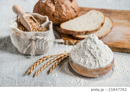 Wheat and flour on the table Wheat and flour on the table 23847762