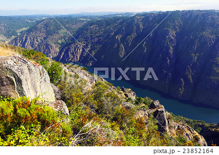 river with steep rocky banks 23852164
