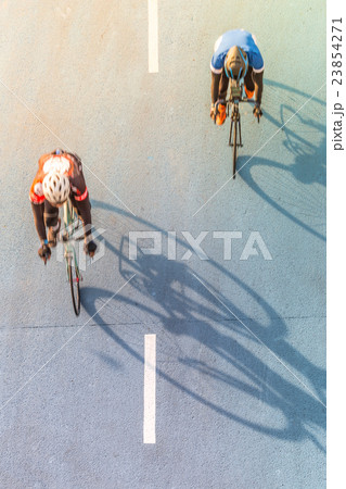 Bicycle lane and biker riding, Top view Bicycle lane and biker riding, Top view 23854271
