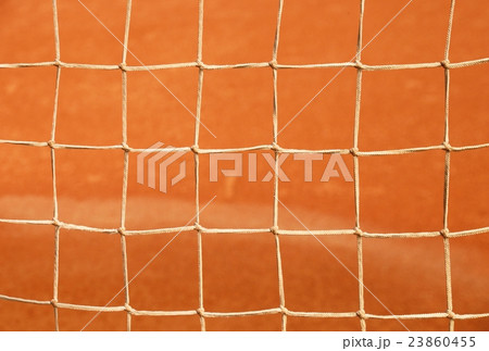 Old net with ground and white line tennis court 23860455