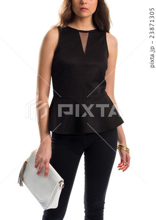 Woman in black sleeveless blouse. Woman in black sleeveless blouse. 23871305